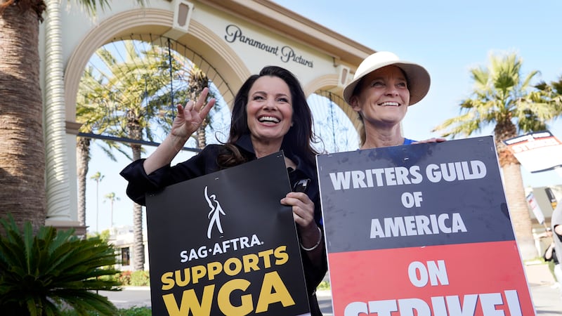 FILE - Fran Drescher, left, president of SAG-AFTRA, and Meredith Stiehm, president of Writers...
