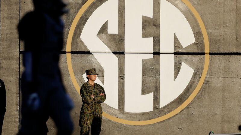 An SEC logo is painted on the wall inside Vanderbilt Stadium in the first half of an NCAA...