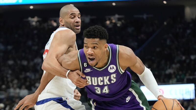 Los Angeles Clippers' Nicolas Batum fouls Milwaukee Bucks' Giannis Antetokounmpo during the...