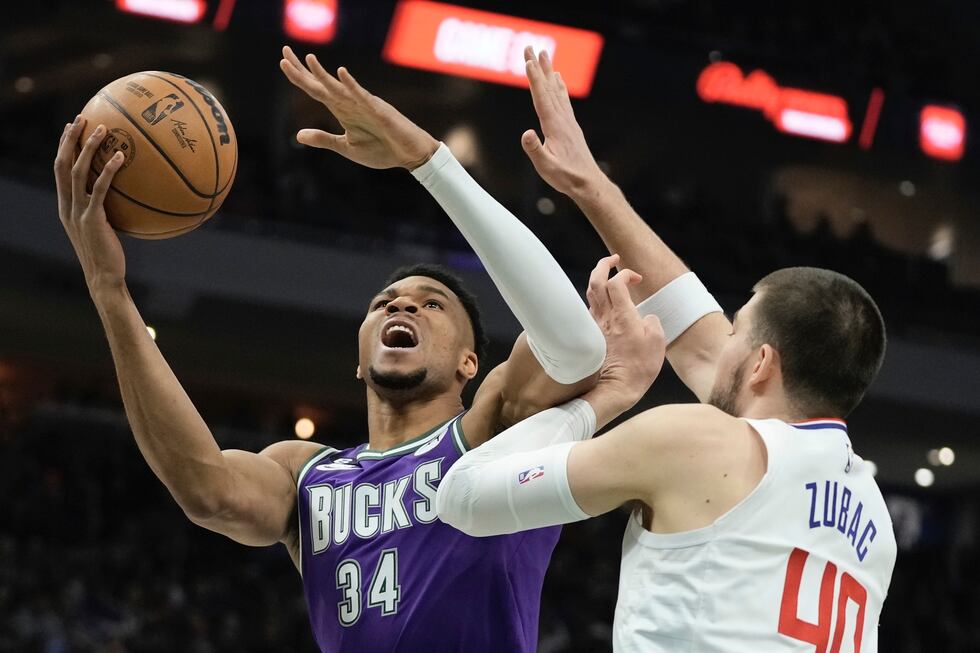 Milwaukee Bucks' Giannis Antetokounmpo shoots past Los Angeles Clippers' Ivica Zubac during...