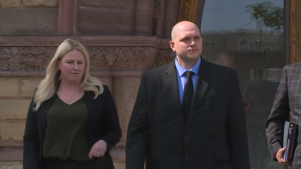 Adam Fravel leaving Winona County Courthouse.